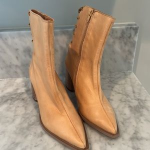 Beautiful calfskin Free People boots. Never worn. Lovely lace up detail in back